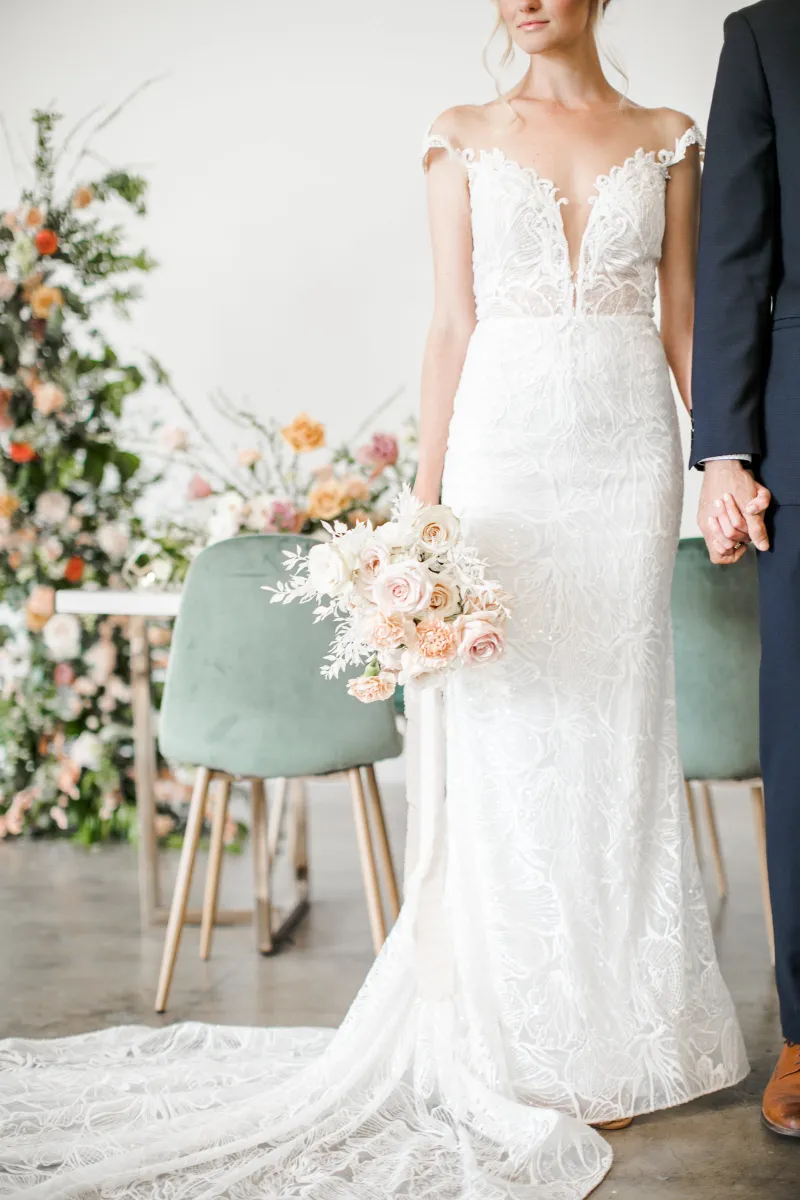Bride and groom among the flowers