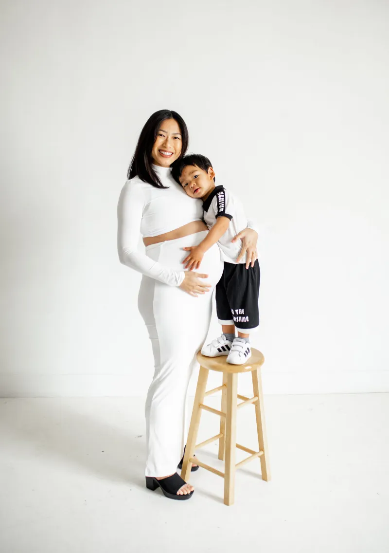 Expecting mother and toddler